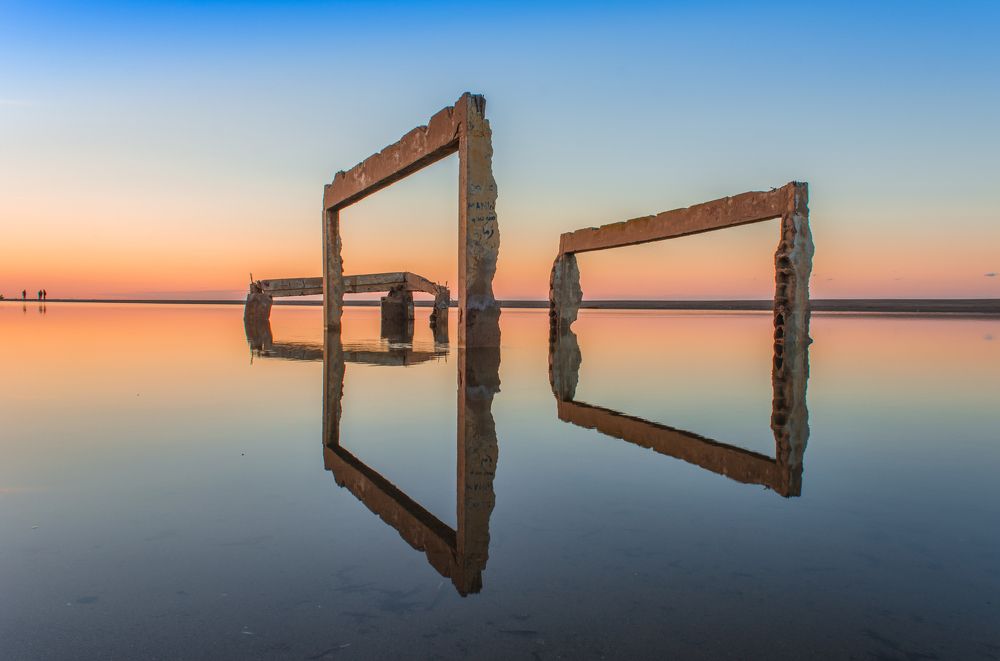 Reflection of the ruins of an old abandoned house