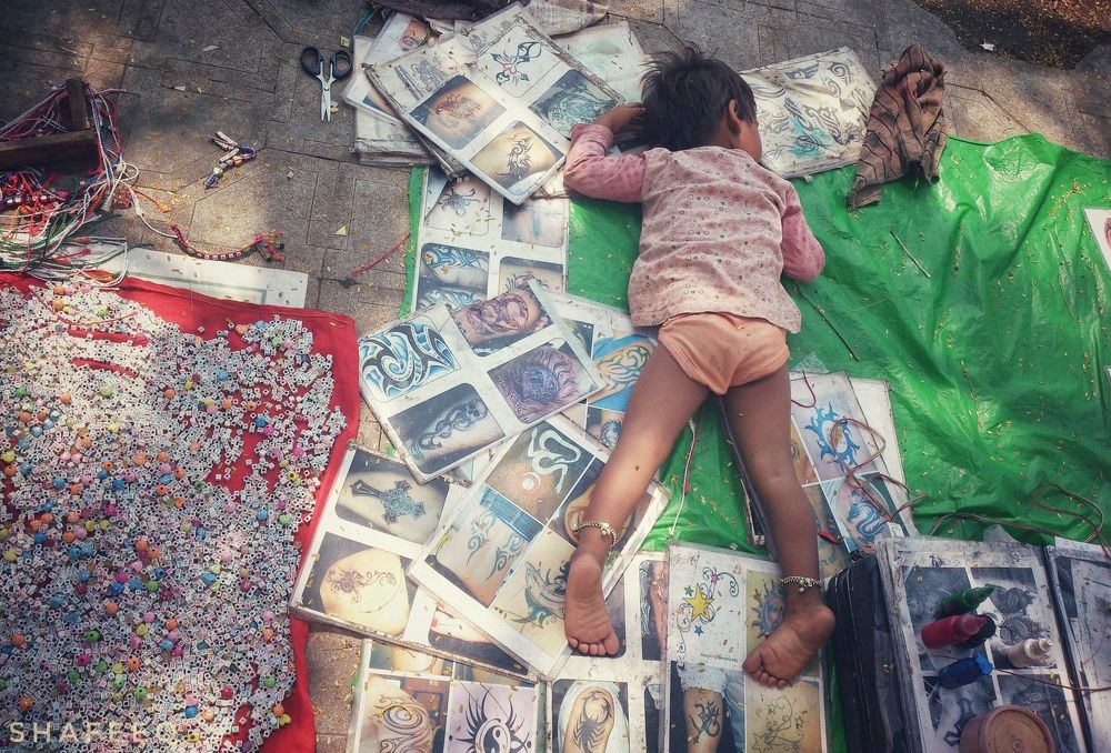 Sleeping child in the street