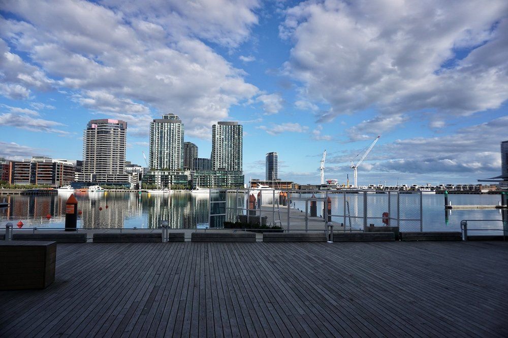 Cityscape with Blue Sky, Calm Water
