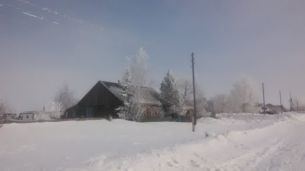 Деревенька в снегу