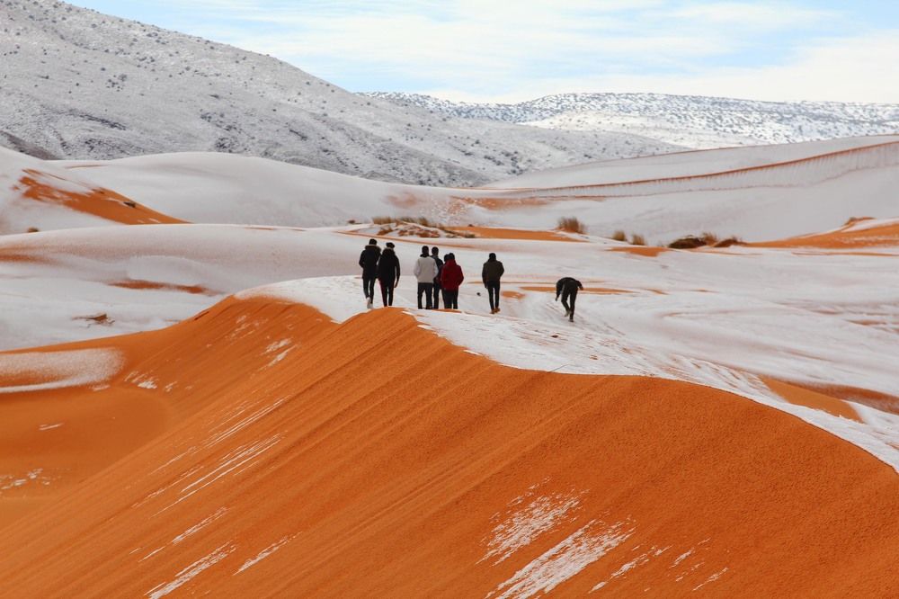 The desert town of Ain Sefra is surrounded by unexpected snow which is several inches deep