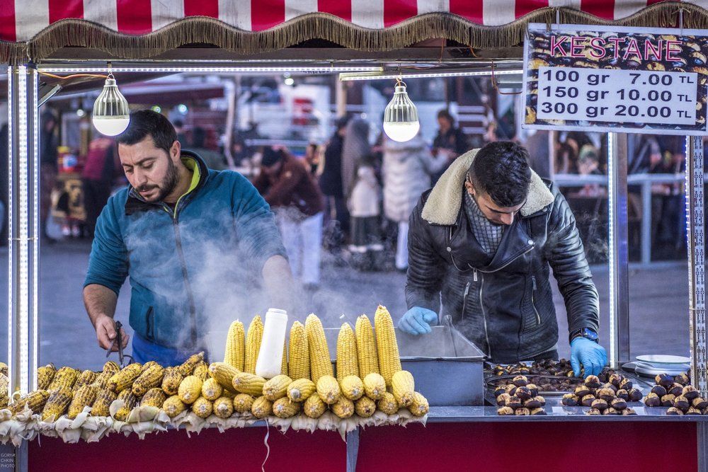 Продавцы жаренного каштана