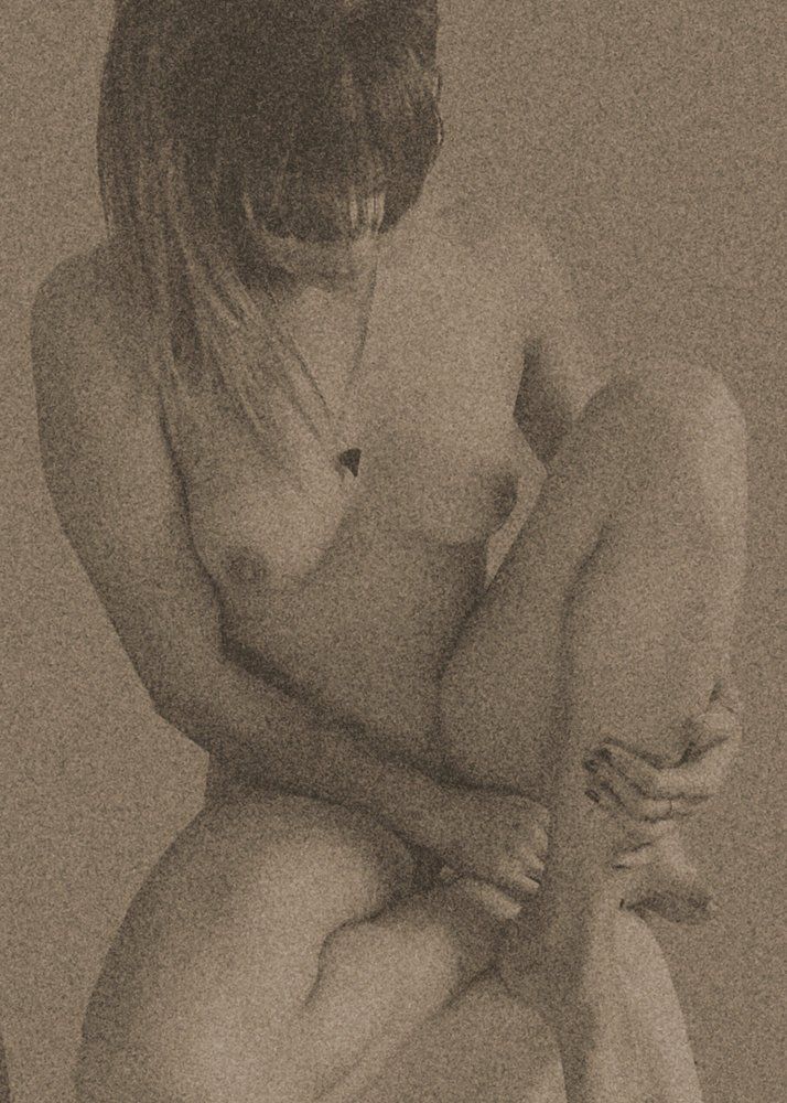 She rests in pensive mood