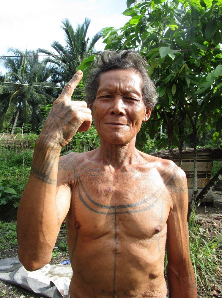 TATTOO ON MENTAWAI FACE