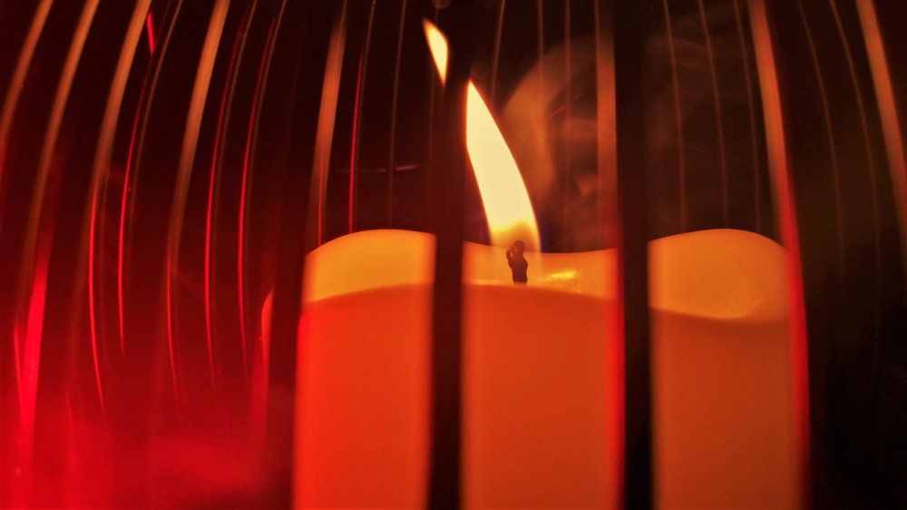Only a candle can both defy and define darkness