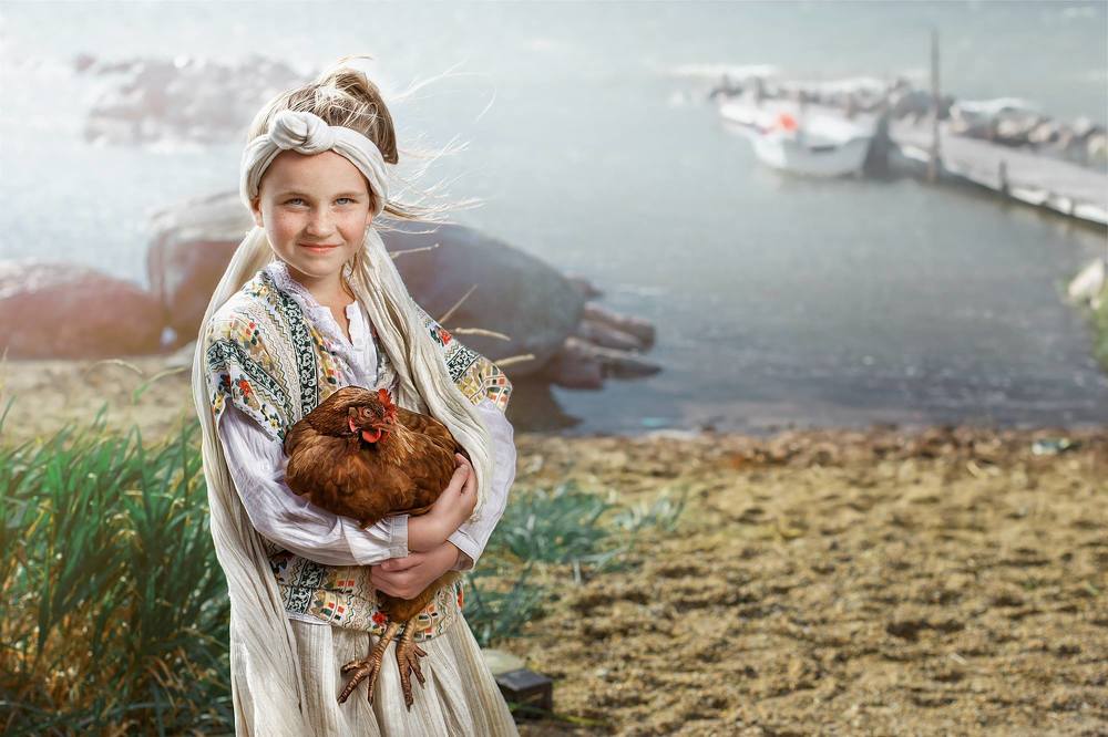Estonian girl with the red hen