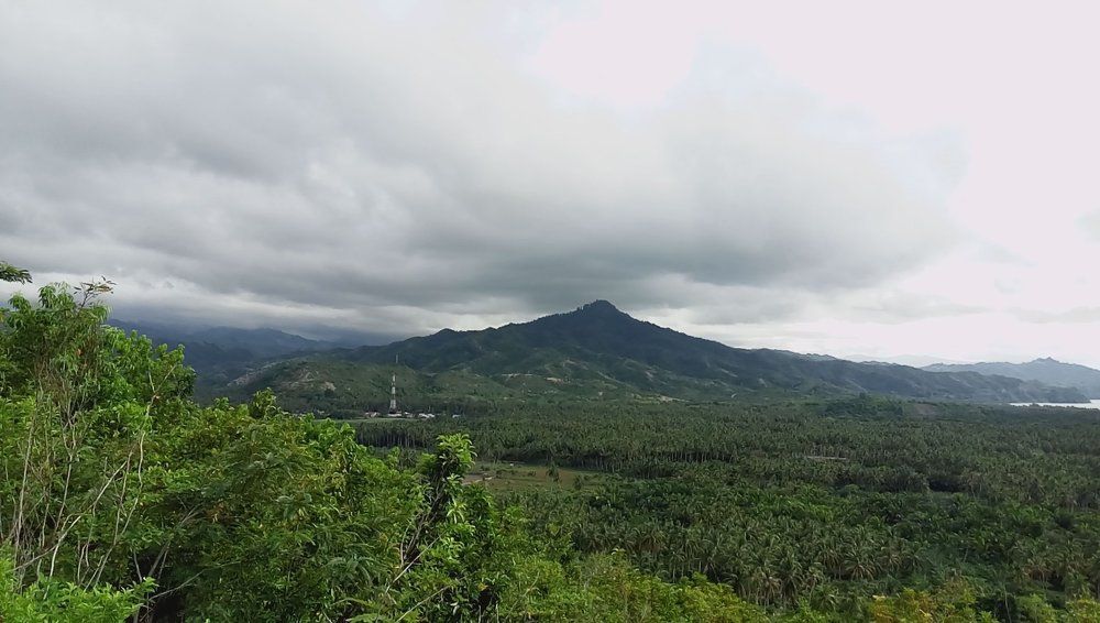 A Mountain & A Grey Umbrella