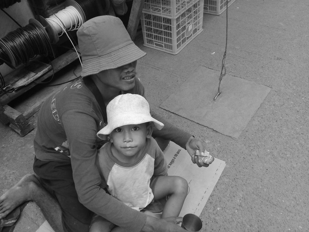 the beggar in the street