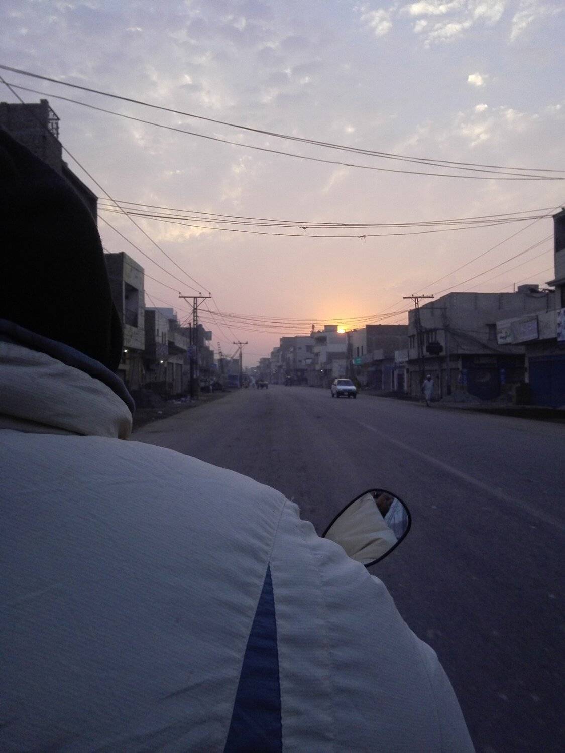 Dad driving while sun rising