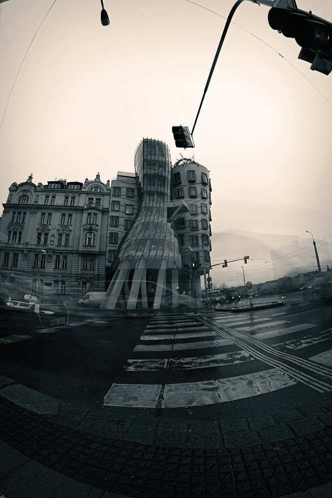 Dancing house and cars