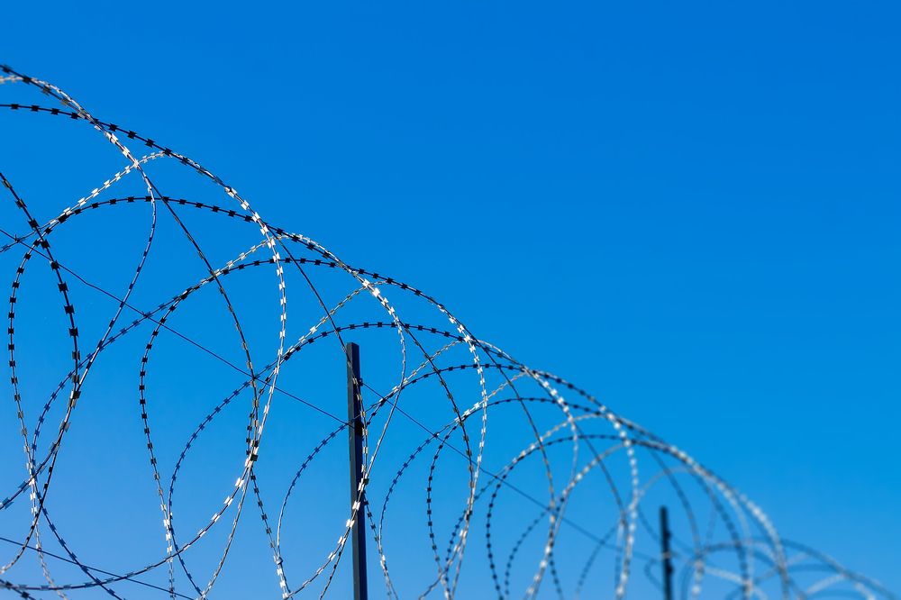 The sky behind the wire