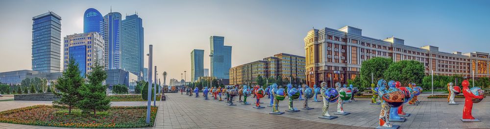 ASTANA, KAZAKHSTAN - July 7, 2016: Morning panorama with plastic figures
