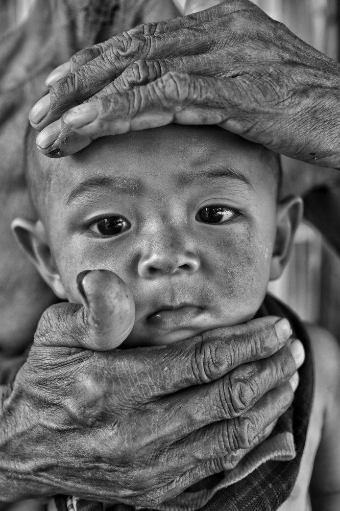 Young face and old finger