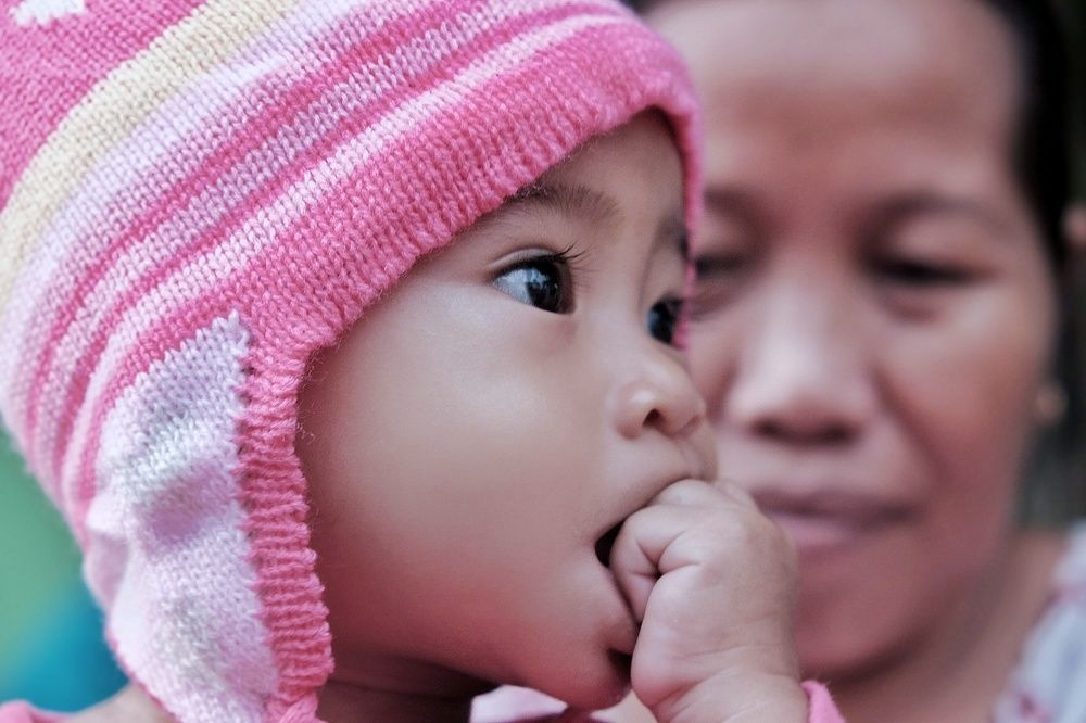 Mother face in child