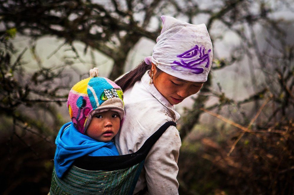 Baby on mother's back