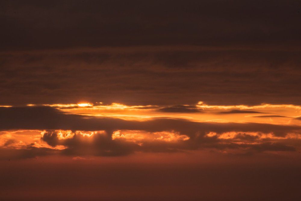 SUNRISE IN THE CLOUDS