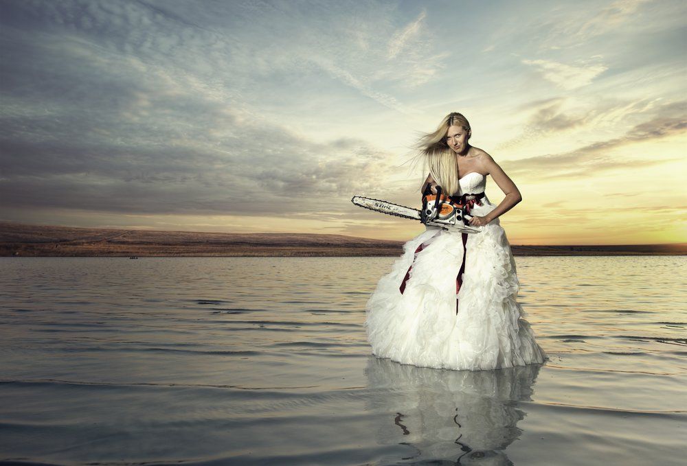 The bride with the chainsaw and clouds