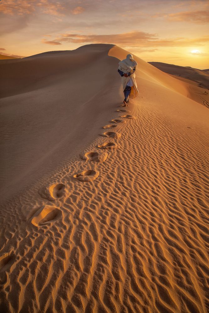 Walking on sand sea