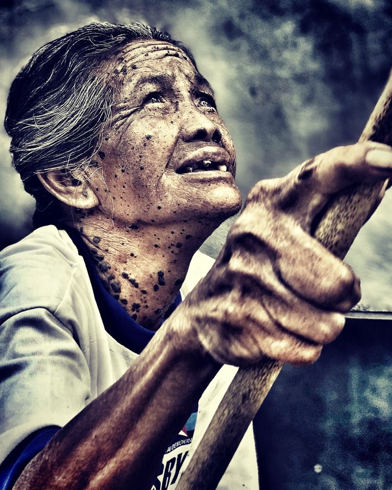 Lady with stick