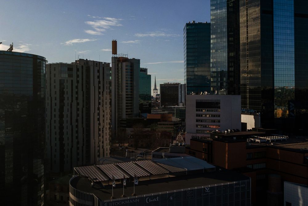 Portrait of an old church in a lumen of the urban jungle.