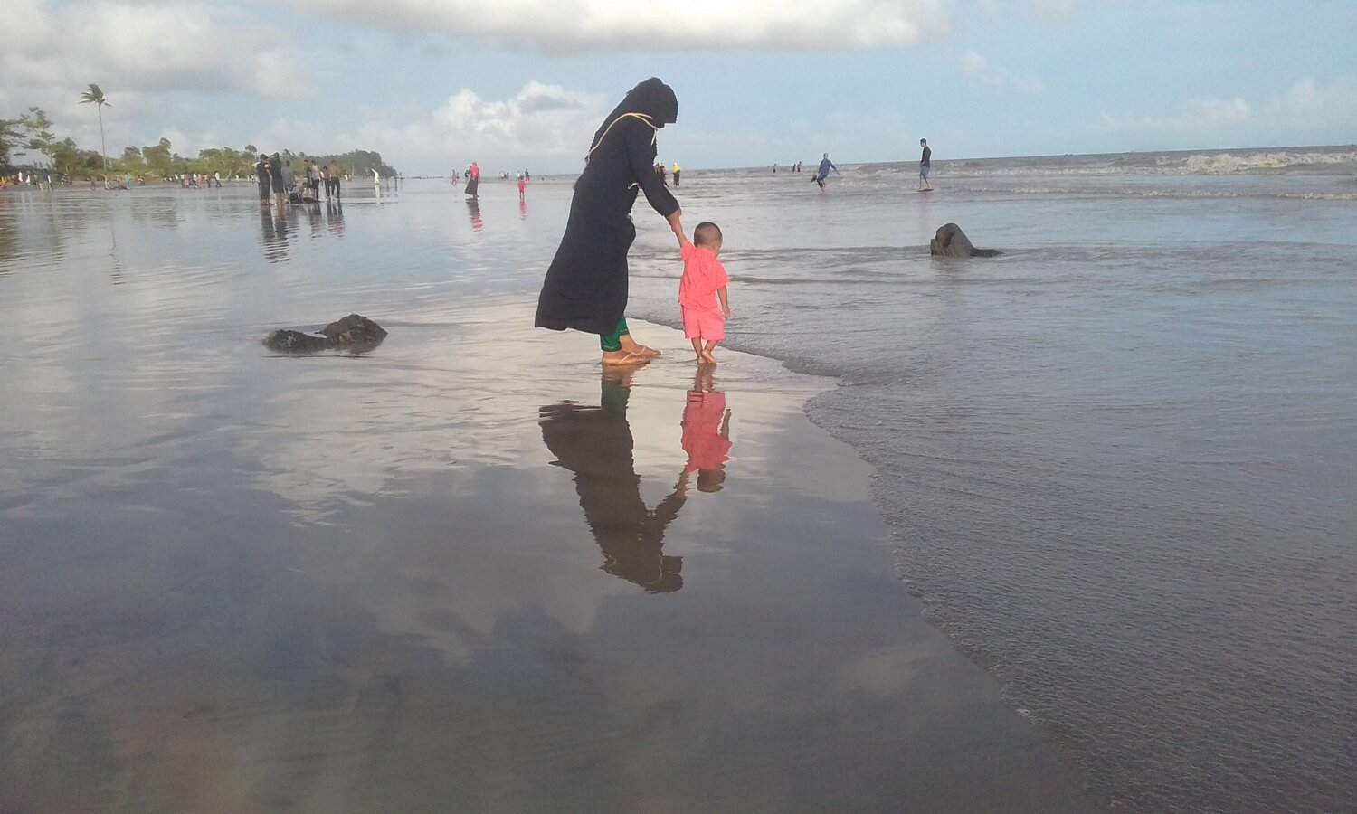 Mother and Son In a Beach