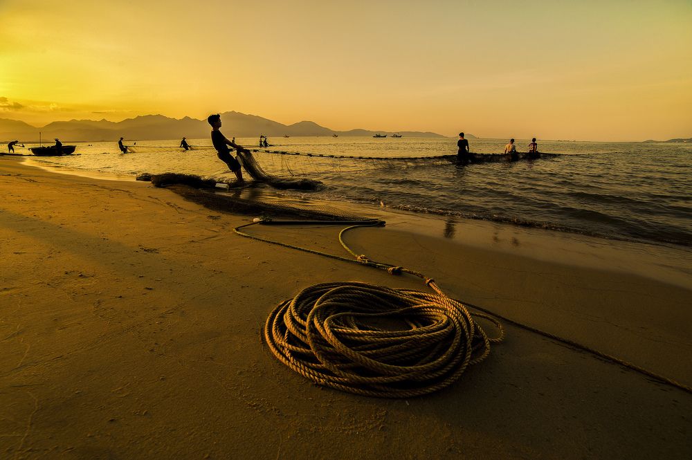 PULLING IN A FISHING NET