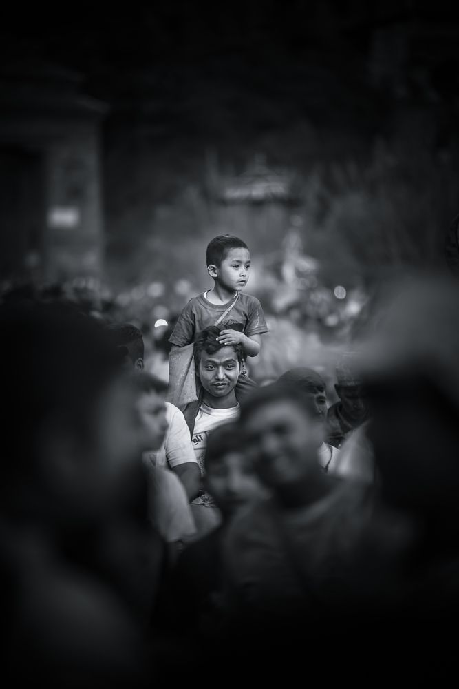 a father carried  his kids