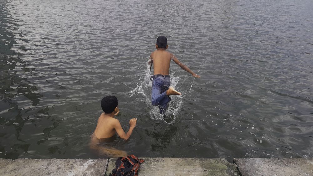 Children plying in water