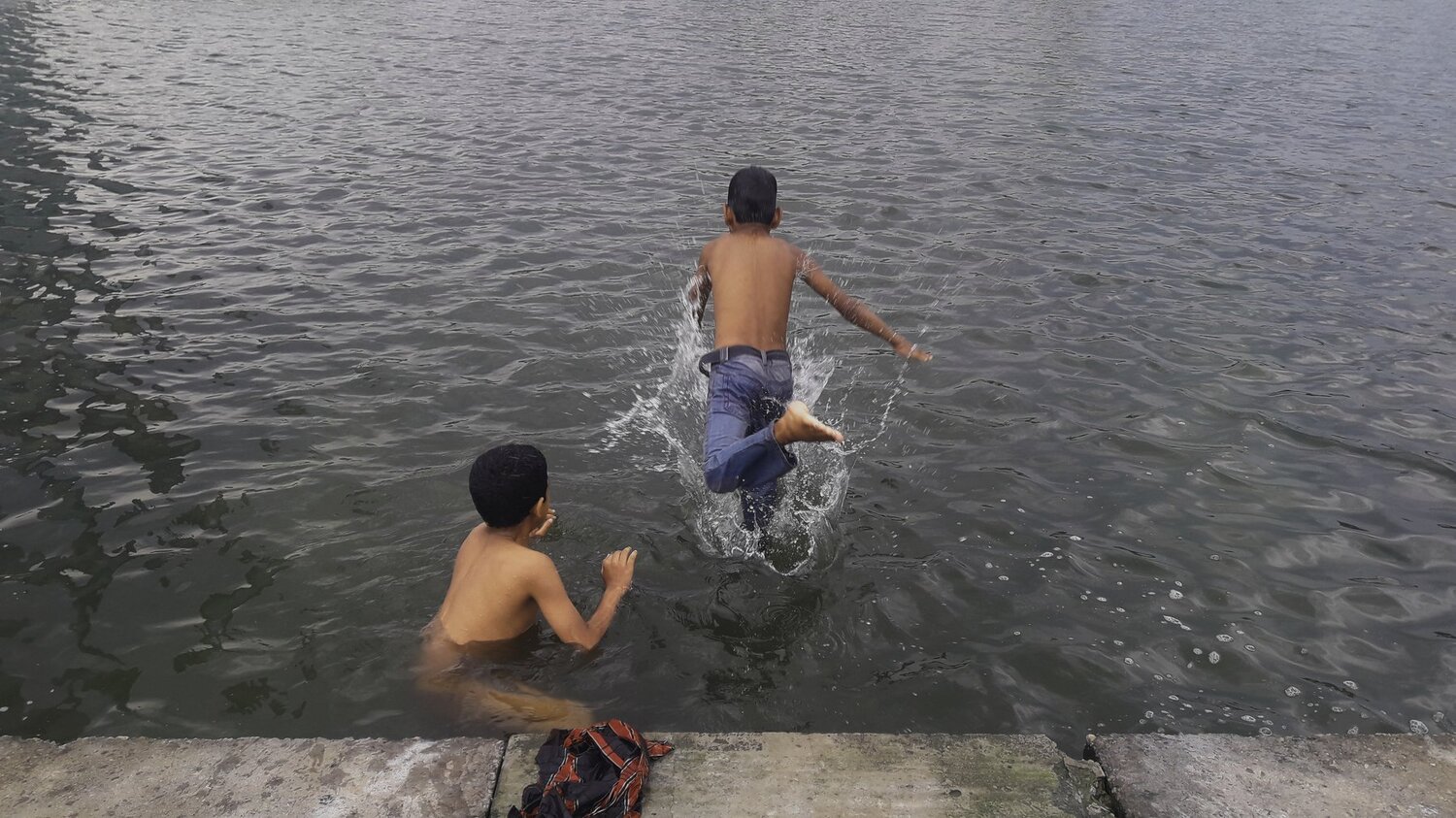 Children plying in water