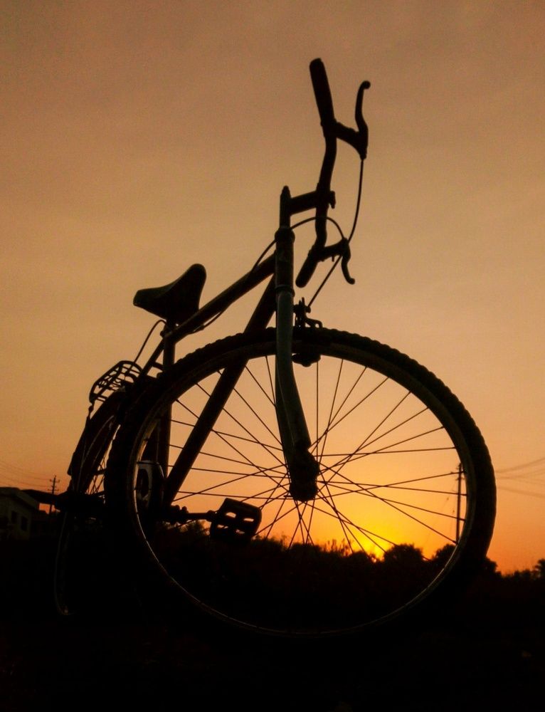 Cylce in setting sun...