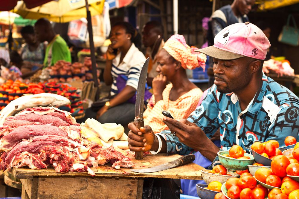 The meat seller and his phone