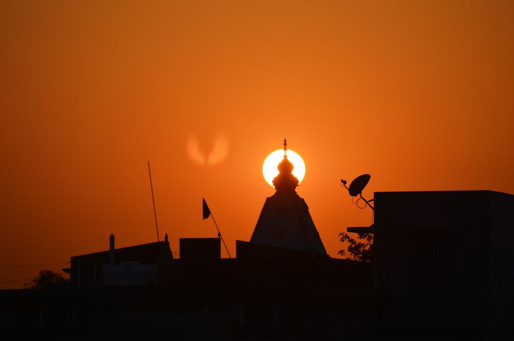 Temple and sun