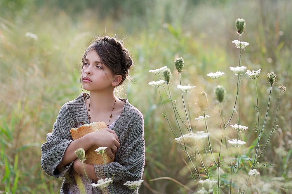 Несла домой хлеб