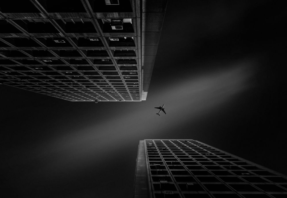 fly above buildings