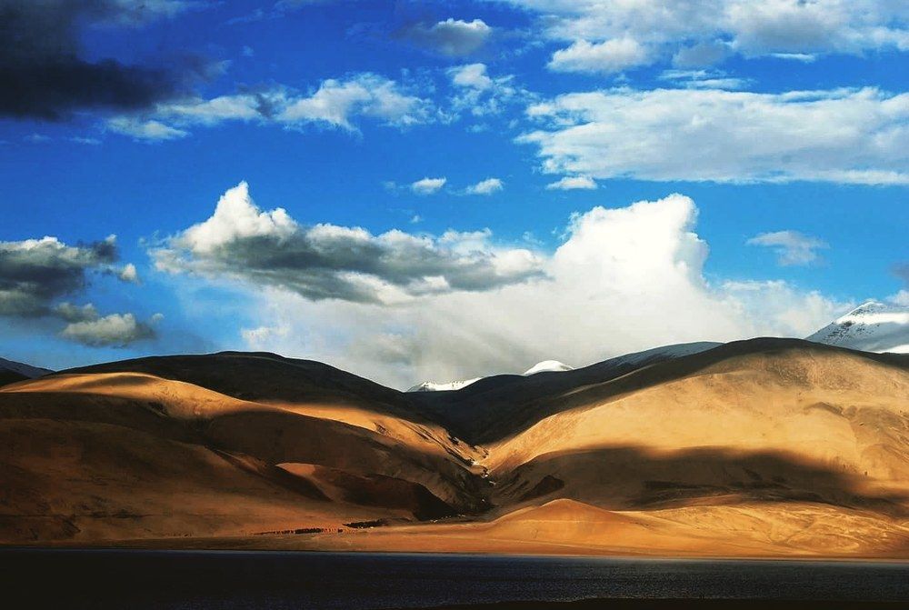 The shadows, hills and lake