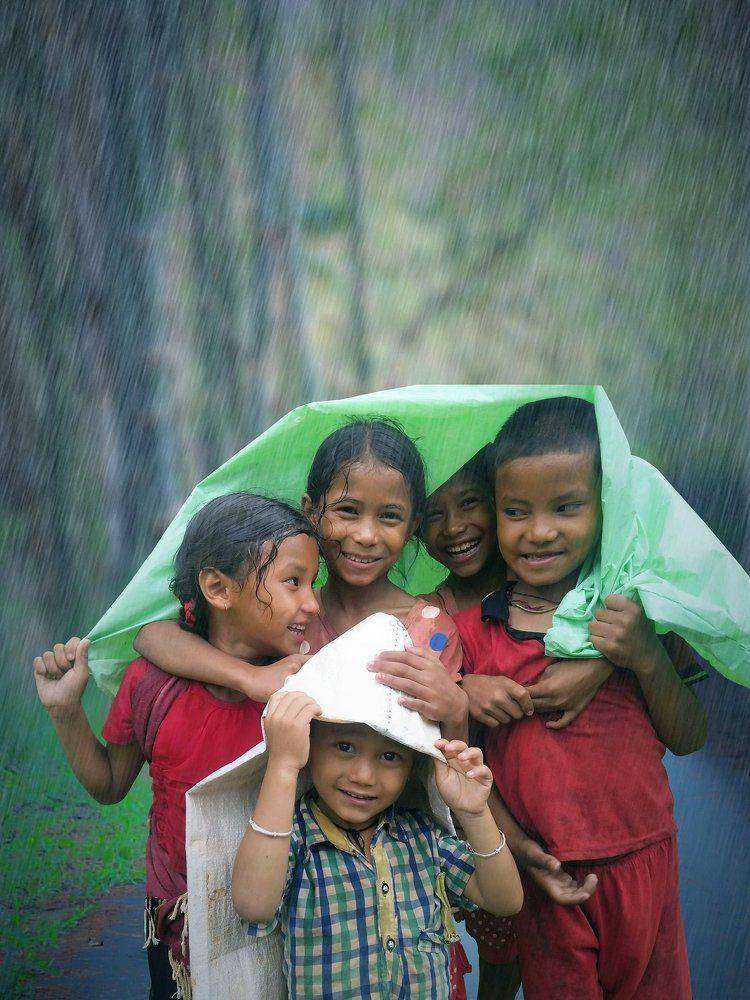 Kids Enjoying the Rain