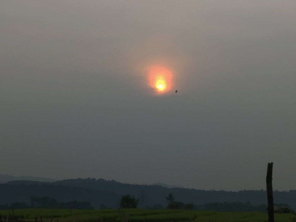 The Sun behind the twilight blanket