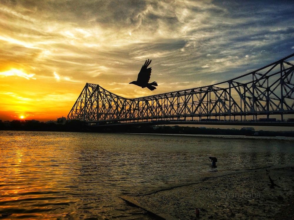 Sunset in Howrah Bridge .