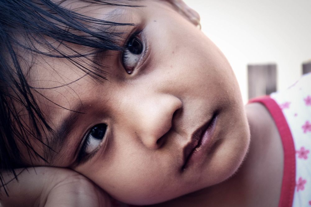 Asian children reflecting