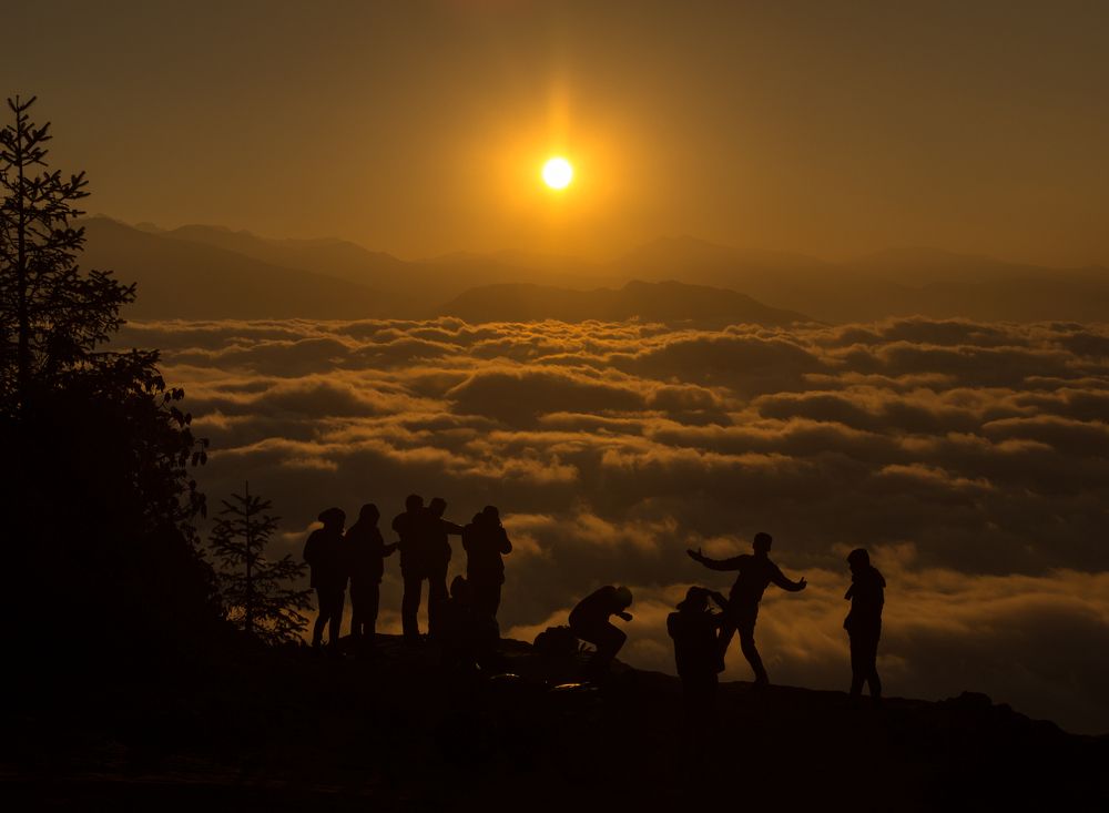 Sunrise above clouds.