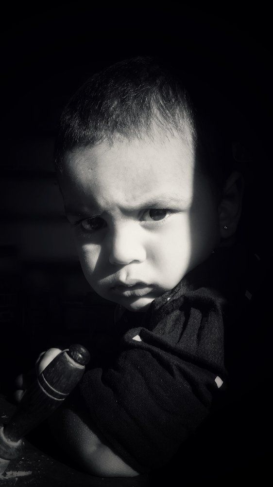 looking out from shadow...