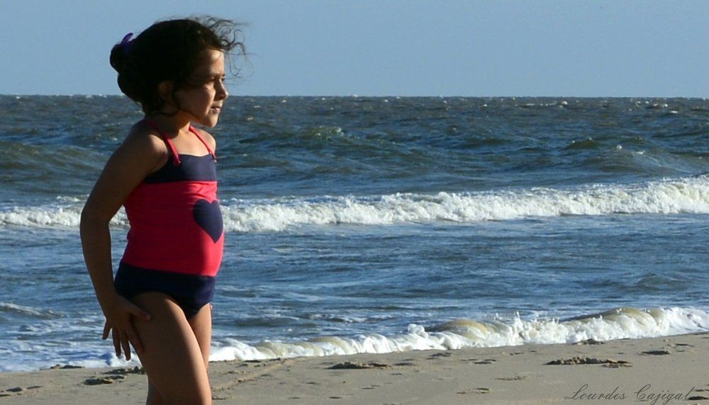 Emilia enjoying the beach