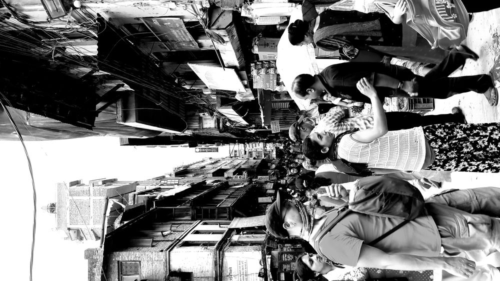 Between the crowd of people