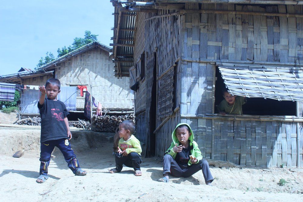 Tribe Children watching photographer