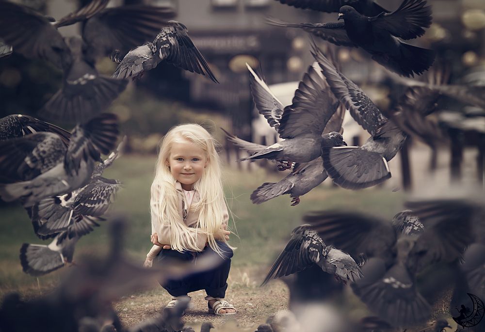 Girl with pigeons