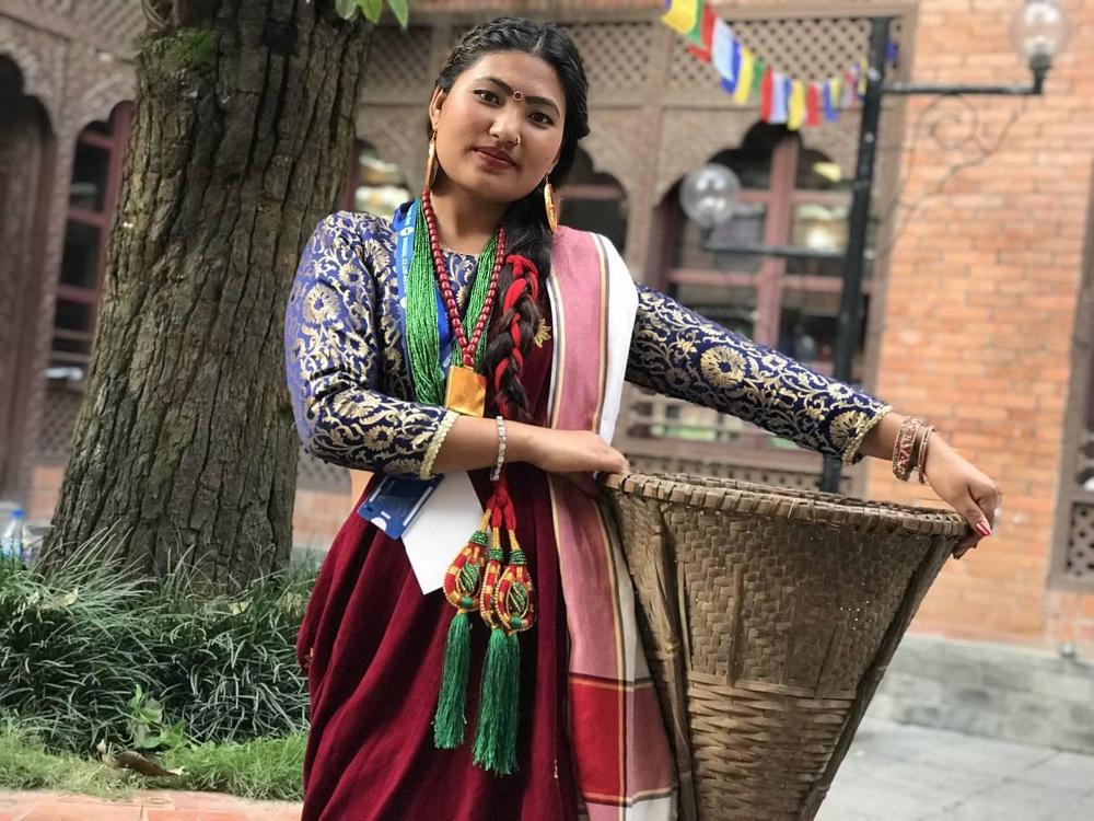 nepali lady with Soli(Bucket)
