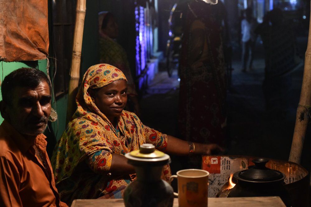 Smile of a female street side cake seller