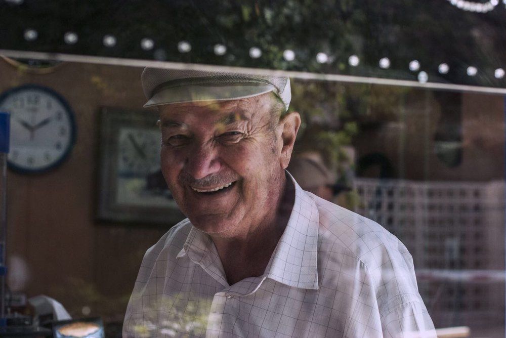 Old man smiles