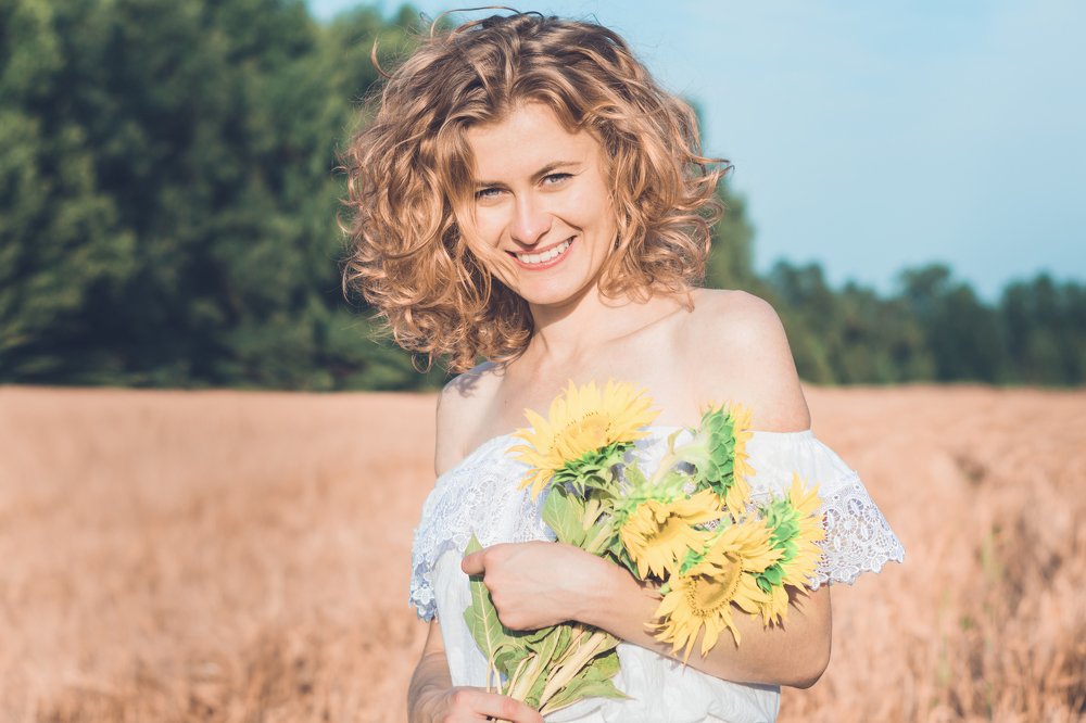 Girl with sunflowers