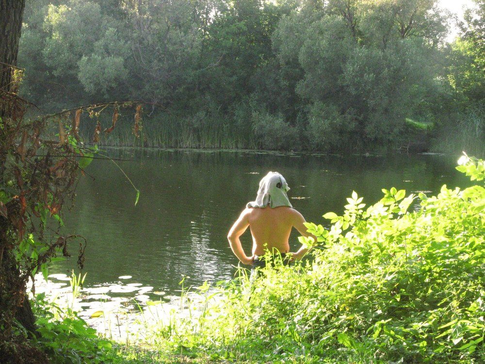 В раздумье на берегу реки ...He is just a bit pensive.